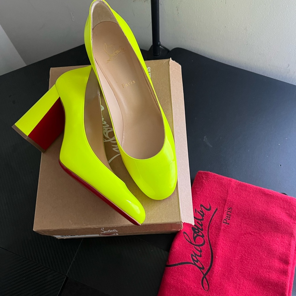 Yellow patent louboutins